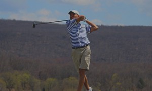 Golfer swinging