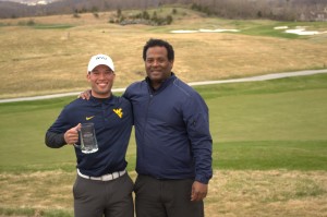 Two golfers standing on golf course