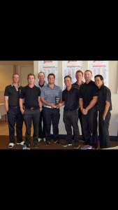 Golfers with trophy