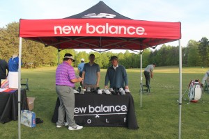 New Balance Golf tent with shoe display set up on course